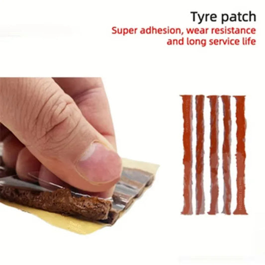 Tyre patch with a hand holding it and three additional patches on a white background.