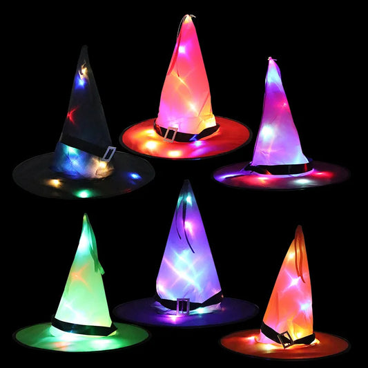 Set of colorful LED witch hats on a black background