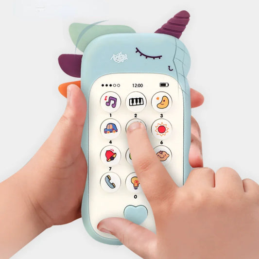 Children's toy phone with cartoon unicorn design held by a hand on a white background