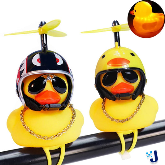 Two rubber duckies wearing helmets and sunglasses with a close-up inset showing one duckie.