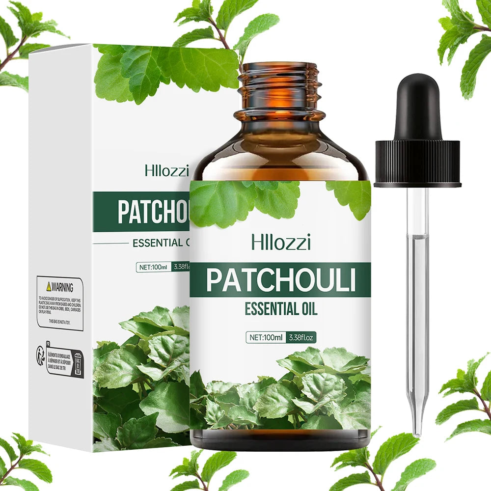 Hllozzi Patchouli essential oil bottle with dropper and packaging on a white background with green leaves.