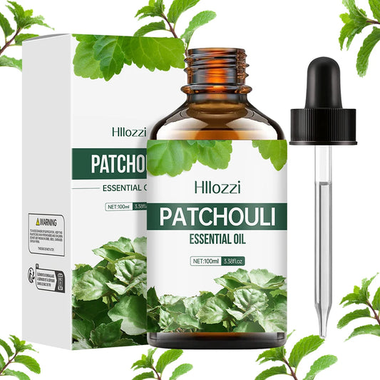 Hllozzi Patchouli essential oil bottle with dropper and packaging on a white background with green leaves.