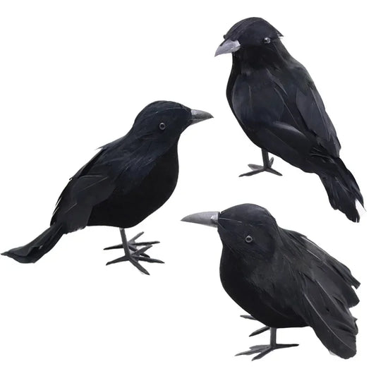 Three black crows on a white background