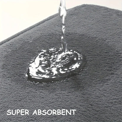 Gray towel with water droplet and 'SUPER ABSORBENT' text