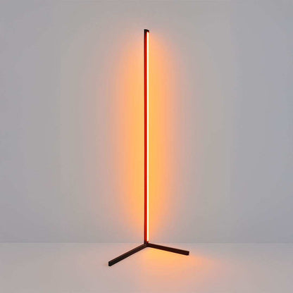 Modern floor lamp with a vertical light source on a plain background