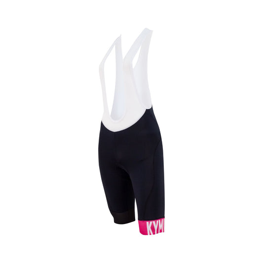Black cycling bib shorts with white top and pink logo on a white background