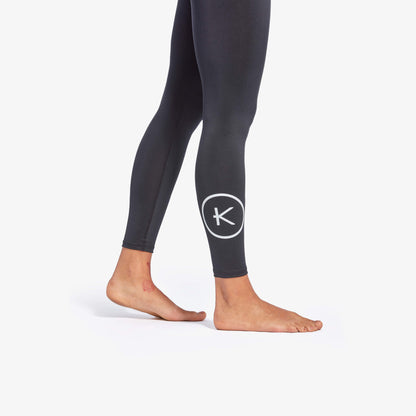 Black leggings with a logo on a white background
