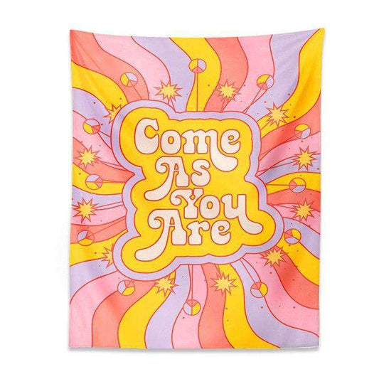 Colorful tapestry with 'Come As You Are' text and abstract design on a white background