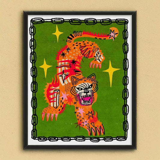 Framed artwork of a colorful tiger design on a green background with stars.
