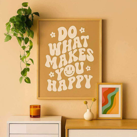 Framed motivational poster with decorative elements on a beige wall