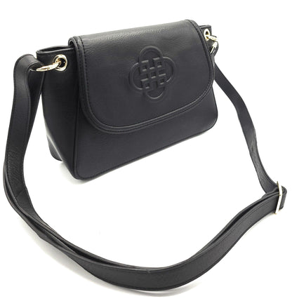 Black handbag with a strap on a white background
