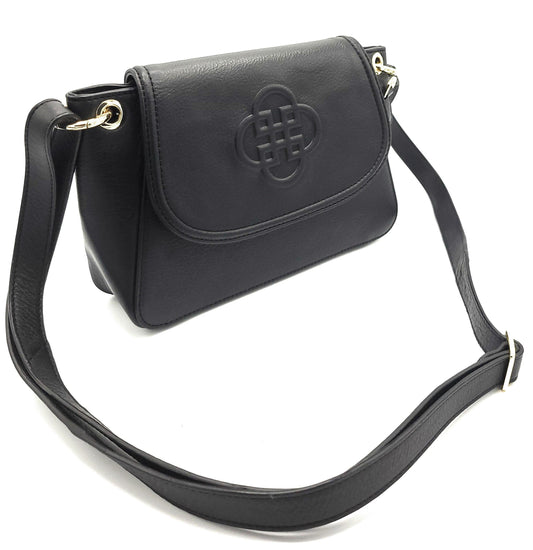 Black handbag with a strap on a white background