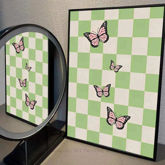 Framed artwork with pink butterflies on a green and white checkered background