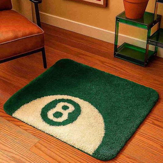 Green and white pool ball-shaped rug on a wooden floor