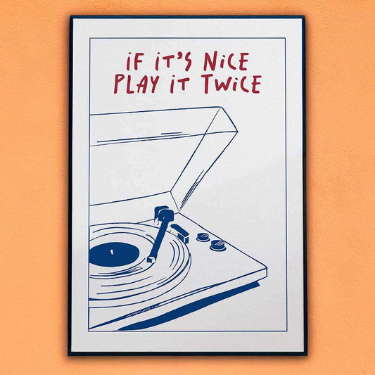 Framed poster with a record player illustration and text 'If it's nice play it twice' on an orange background