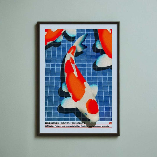 Framed artwork of koi fish on a blue grid background
