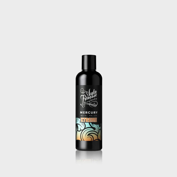 Black bottle with colorful label on a white background