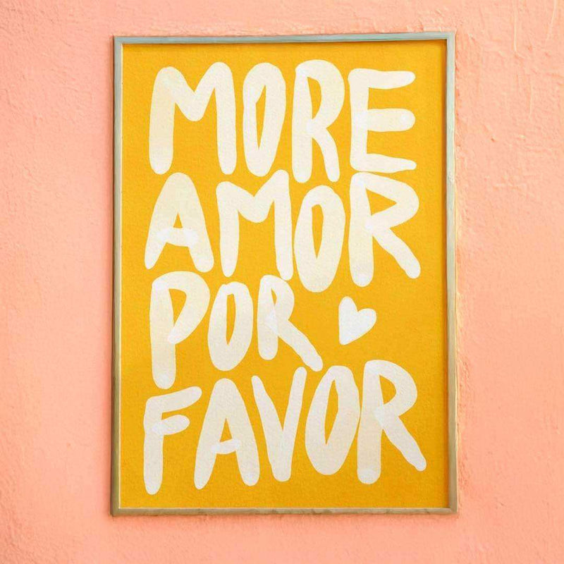 Framed artwork with 'More Amor Por Favor' text on a yellow background