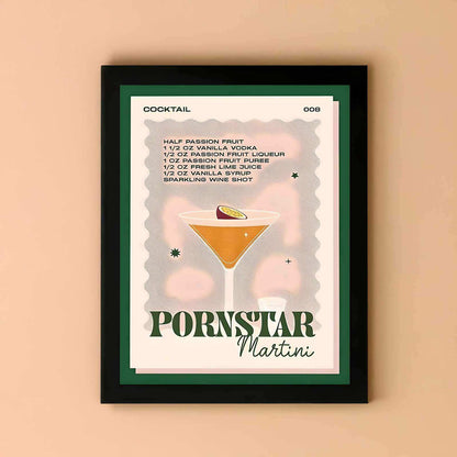 Framed poster of a cocktail recipe for 'Pornstar Martini' on a beige wall.