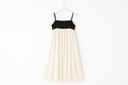 Professional product image of contrast sling dress on hanger