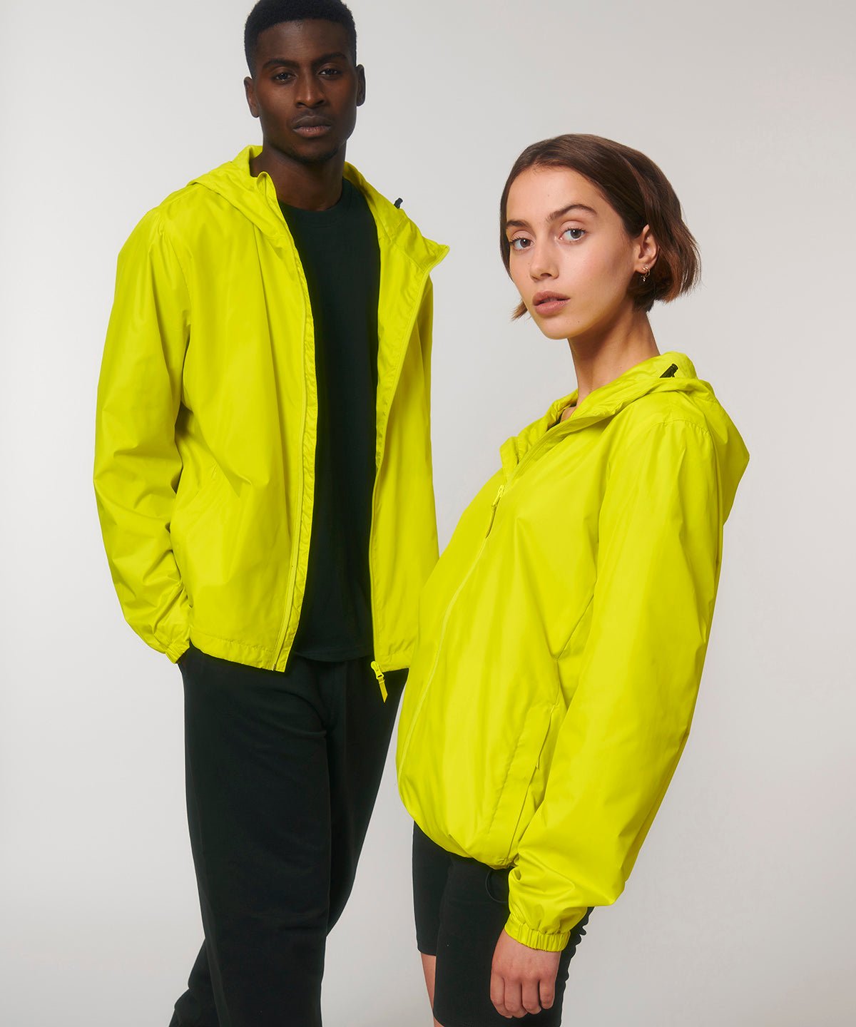 two peoplle wearing Recycled Polyester Lightweight Waterproof Jacket | Bascora