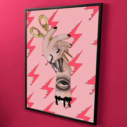 Framed artwork with abstract design on a pink background