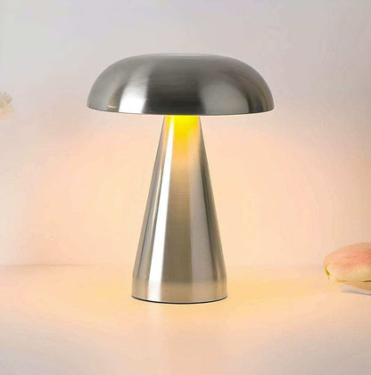 Metallic table lamp on a soft focus background