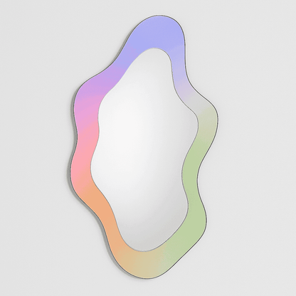 Gradient-colored mirror with wavy edge on a light gray background