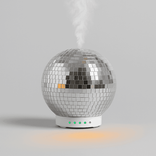 Silver disco ball humidifier on a gray background