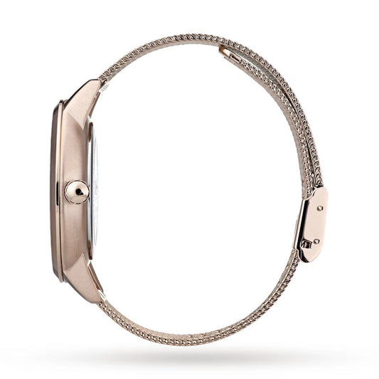 Rose gold watch with a mesh band on a white background