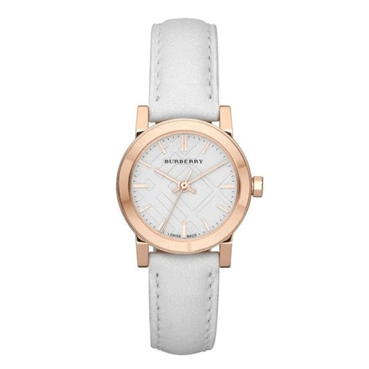 Burberry watch with white strap and rose gold case on a white background