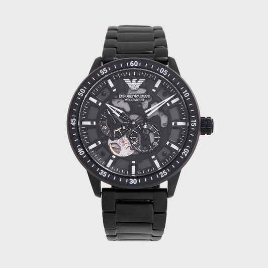 Black Emporio Armani watch on a light gray background