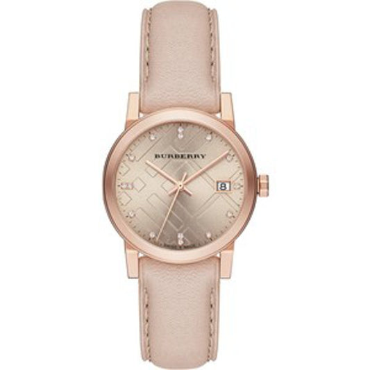 Burberry watch with rose gold case and beige strap on a white background