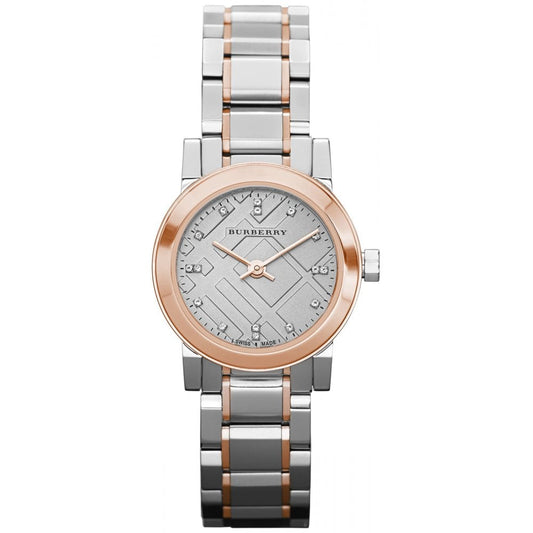 Burberry watch with two-tone metal strap on a white background