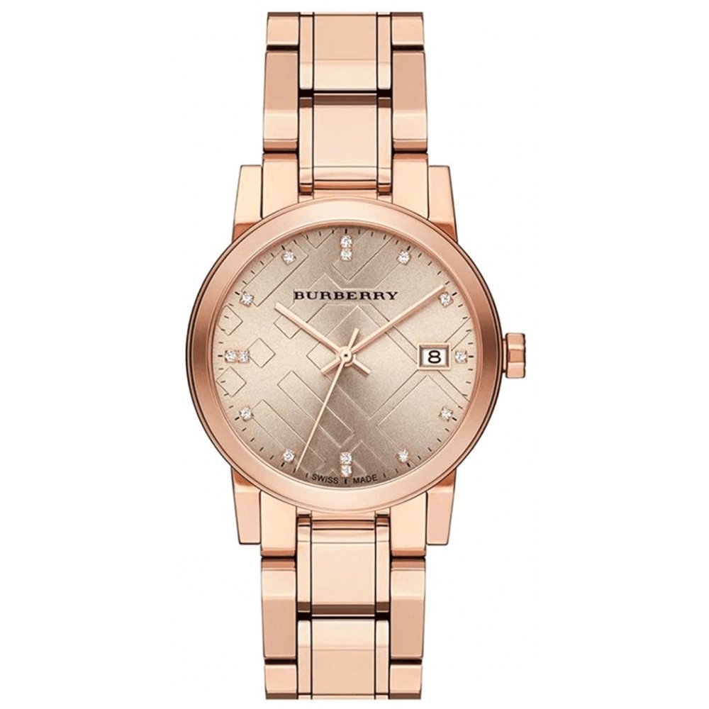 Rose gold Burberry watch on a white background
