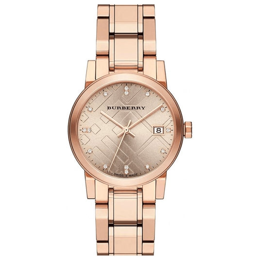 Rose gold Burberry watch on a white background