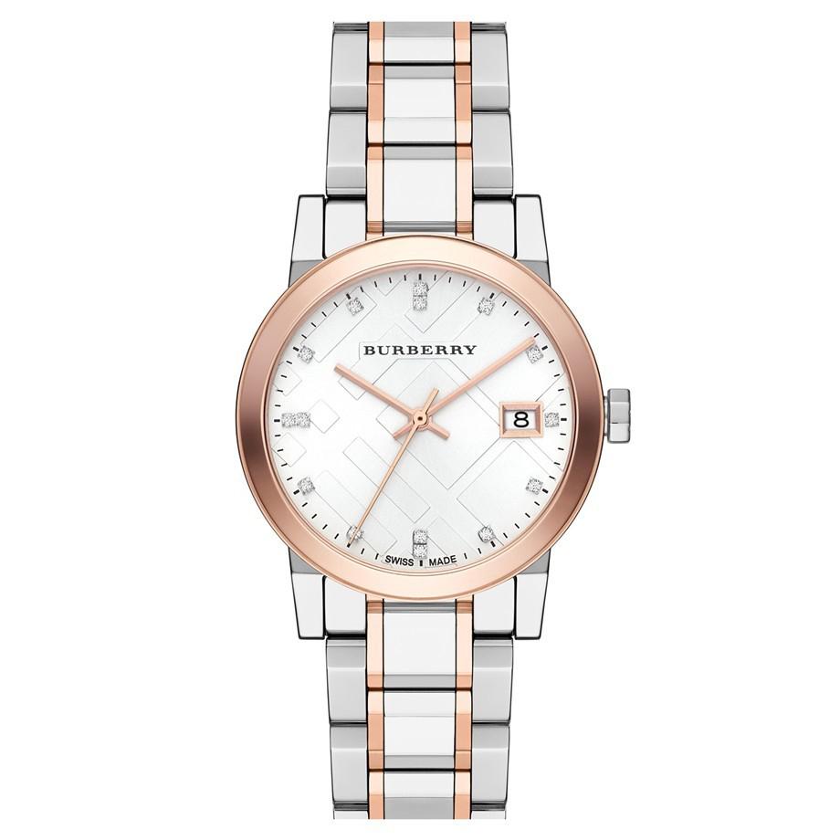 Burberry watch with two-tone rose gold and silver bracelet on a white background
