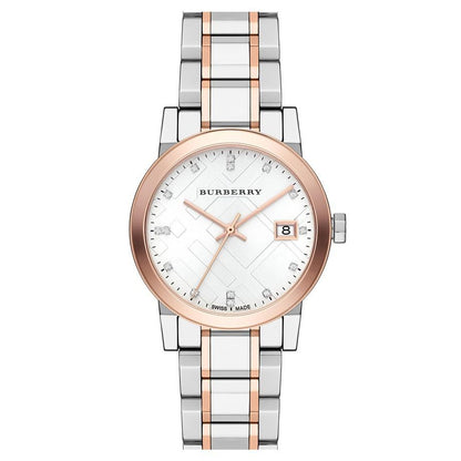 Burberry watch with two-tone rose gold and silver bracelet on a white background