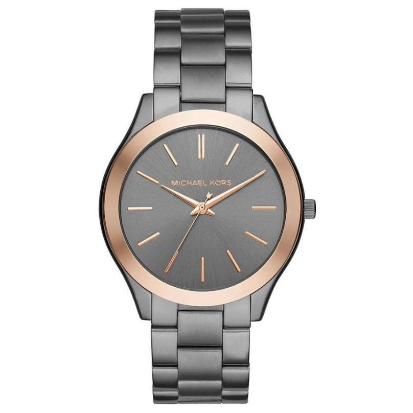 Michael Kors watch with rose gold bezel and gray bracelet on white background