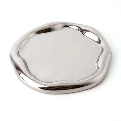 Silver metallic object on a white background
