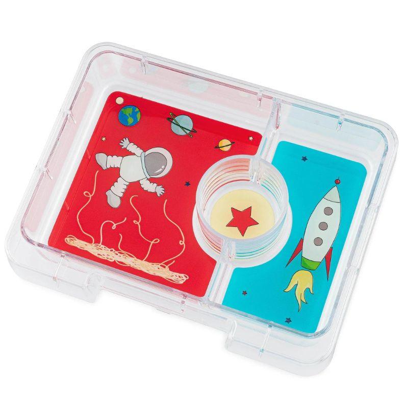 Transparent lunch box tray with spaceman and rocket design on a white background